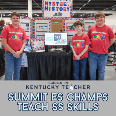 Three Summit Elementary STLP students stand in front of their winning project booth, “Mystery History,” featuring a computer display and colorful backdrop at the STLP State Championship.